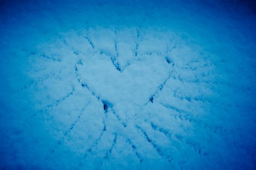 Heart in the snow - valentine\'s day or christmas background