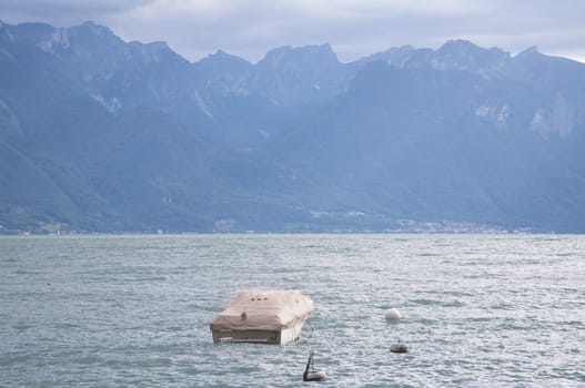 A Covered Boat on Lake Geneva in Montreux, Switzerland