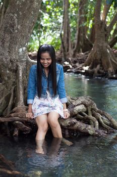 asian woman portrait in beautiful nature scene