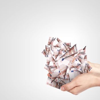 Human hand holding money on white background