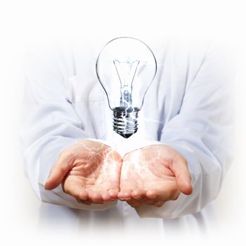 Hand with lamp and hands of a business person