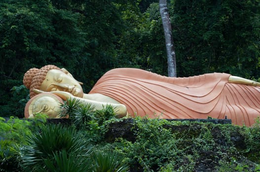 sleeping buddha statue architecture at krabi, thailand