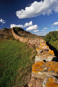 Landscape with an ancient stone wall