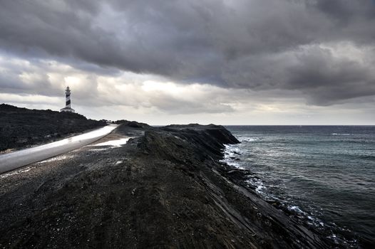 Landscape with a lighthouse on the cliff