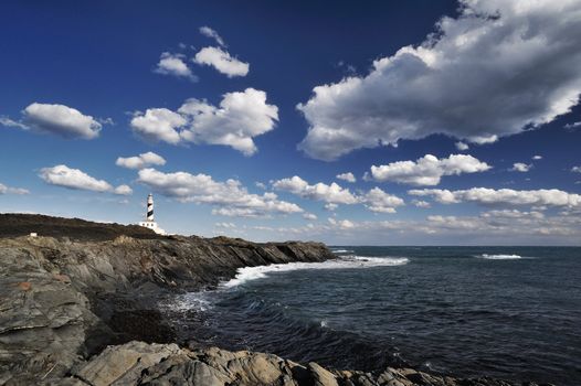 Beautiful landscape with a lighthouse on the cliff