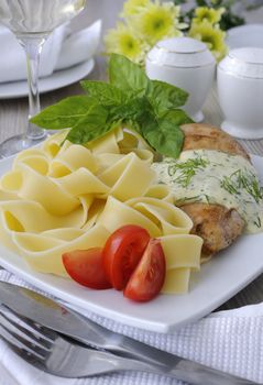 Italian pasta - Pappardelle with chicken in cream sauce and cherry tomatoes