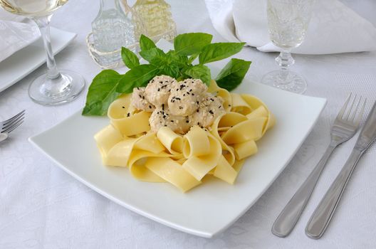 Italian pasta - Pappardelle with chicken fillet in a creamy sauce with sesame seeds