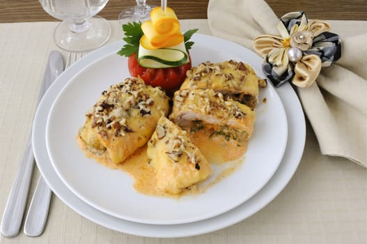 Chicken breast stuffed with cheese and spinach under the walnut-cream sauce