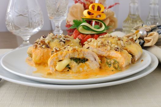 Chicken breast stuffed with cheese and spinach under the walnut-cream sauce