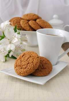 Morning cup of tea with oatmeal cookies