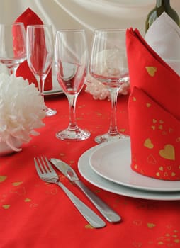 Fragment table setting in red and white style