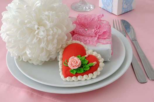 Fragment table setting with marzipan heart and gift