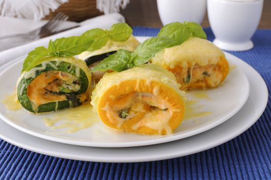 Zucchini rolls stuffed with spinach and cheese