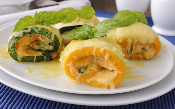 Zucchini rolls stuffed with spinach and cheese