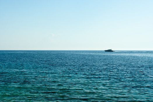 One yacht on open water