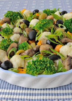 Vegetable casserole with broccoli and cauliflower, mushrooms and olives