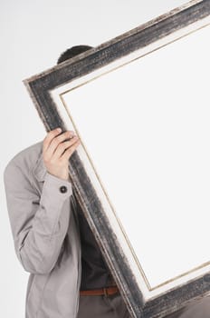 Man holding empty frame