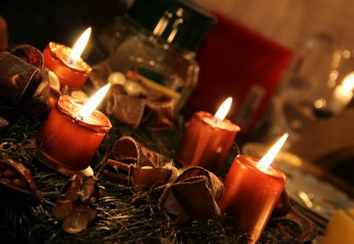 Christmas wreath and burning candles