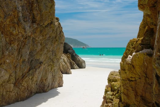 Cave in the rocks in a Crystalline clear waters in Arraial do Cabo, Rio de Janeiro, Brazil 