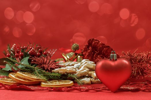 background with red heart,and gingerbreads on red