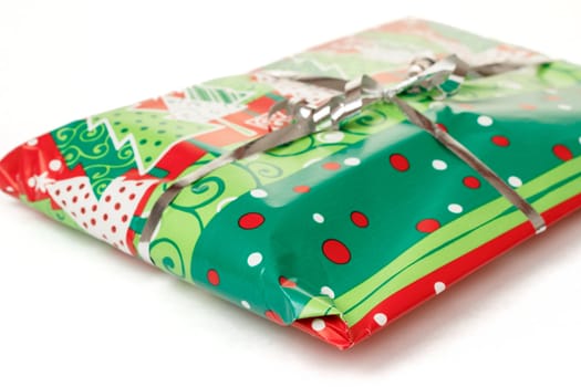 christmas gift with silver ribbon isolated on white background