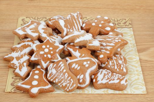 homemade christmas gingerbreads on wooden table