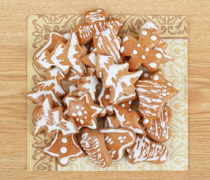 homemade christmas gingerbreads on wooden table