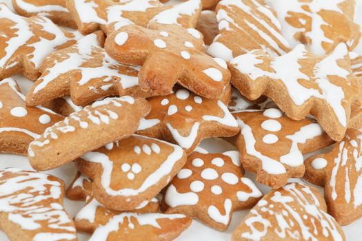 homemade christmas gingerbreads on white background