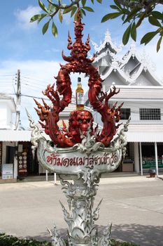 No alcohol sign statue in the famous White Temple in Chiang Rai, Thailand