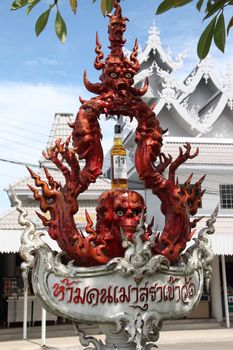 No alcohol sign statue in White Temple in Chiang Rai, Thailand