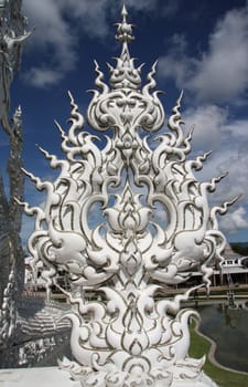 Sculpture in the famous buddhist White temple Wat Rong Khun, Chiang Rai, Thailand