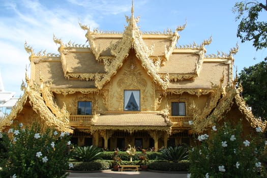 Golden house at the White Temple Wat Rong Khun in Chiang Rai, Thailand