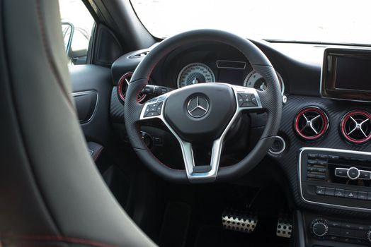 STUTTGART - NOVEMBER 21 : Interior of the new Mercedes Class A 250 AMG Sport parked in front of Solitude Palace on November 21, 2012 in Stuttgart, Germany. The new A-Class is a complete makeover of the previous generations, the 250 AMG Sport is the largest version available, developed together with car tuner AMG.