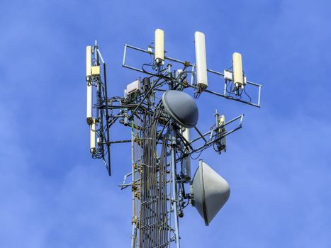 Telecommunications equipment - directional mobile phone antenna dishes. Wireless communication.