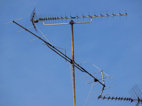 Aerials of a rooftop against blue sky