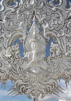 Buddha Sculpture of buddhist white temple Wat Rong Khun, Chiang Rai, Thailand