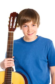 Portrait of cute boy with classical guitar. Isolated on white background