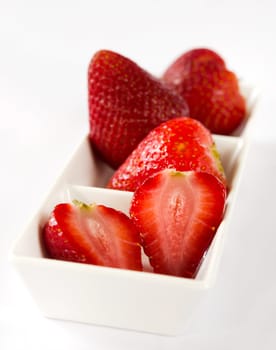 fresh ripe strawberry on white bowl