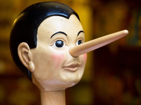  Wooden pinocchio doll with his long nose 