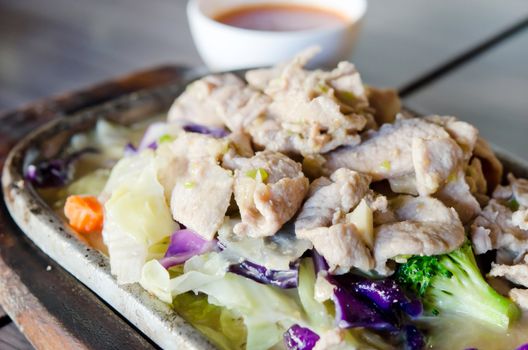 pork  fried with oyster sauce  and broccoli and cabbage