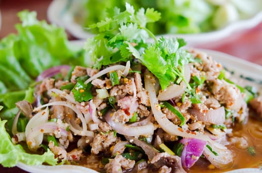 spicy minced pork  with mix vegetable on dish , Thai food

