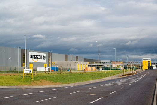 PFORZHEIM - DECEMBER 28, 2012: The newly opened warehouse of retailer amazon.de, the German subsidiary of amazon.com on December 28, 2012 in Pforzheim, Germany. This is the 8th warehouse opened by Amazon in Germany; it has a size of about 110.000 square meters and provides jobs for several hundred workers.