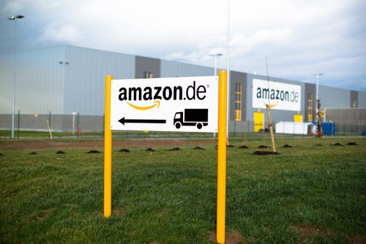 PFORZHEIM - DECEMBER 28, 2012: The newly opened warehouse of retailer amazon.de, the German subsidiary of amazon.com on December 28, 2012 in Pforzheim, Germany. This is the 8th warehouse opened by Amazon in Germany; it has a size of about 110.000 square meters and provides jobs for several hundred workers.