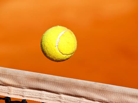 tennis ball ower the net