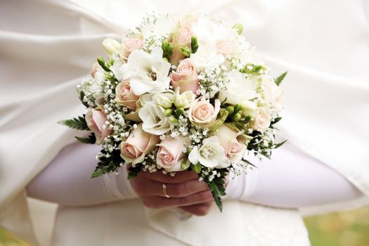 Close up of beautiful and fresh bride flowers bouquet