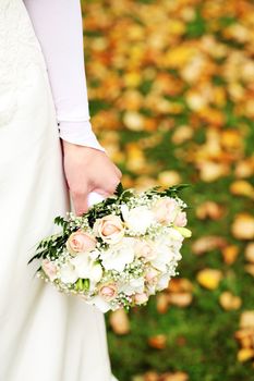 Close up of beautiful and fresh bride flowers bouquet