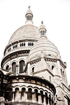 Detail of the Basilica of the Sacred Heart of Paris, commonly known as Sacré-Cœur Basilica, dedicated to the Sacred Heart of Jesus, in Paris, France