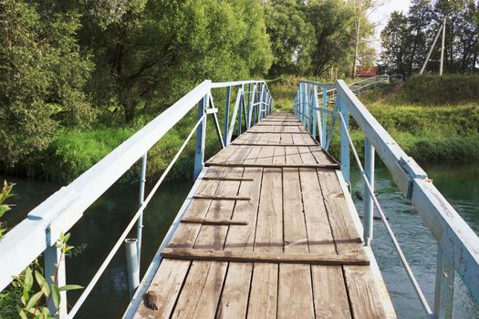 The bridge over the river in a provincial town. Russia