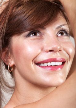 closeup of beautiful happy woman face that smiling