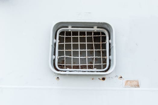 Ship small grey ventilation window, taken on a sunny day
